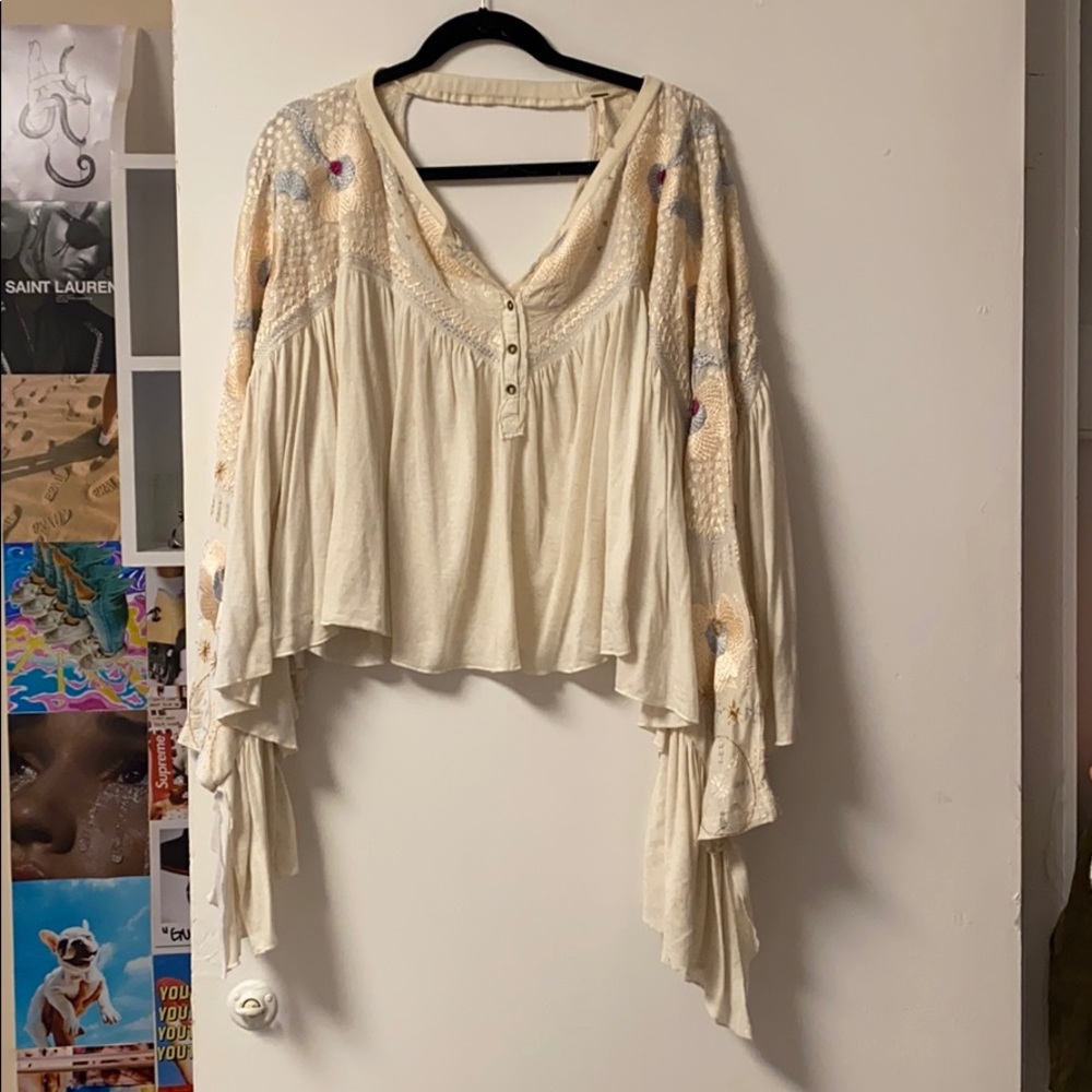 Free People Cream embroidered top.